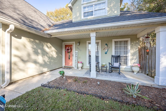 entrance to property with a porch