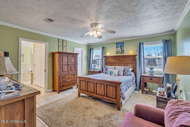 bedroom featuring connected bathroom, ceiling fan, light tile patterned floors, and ornamental molding