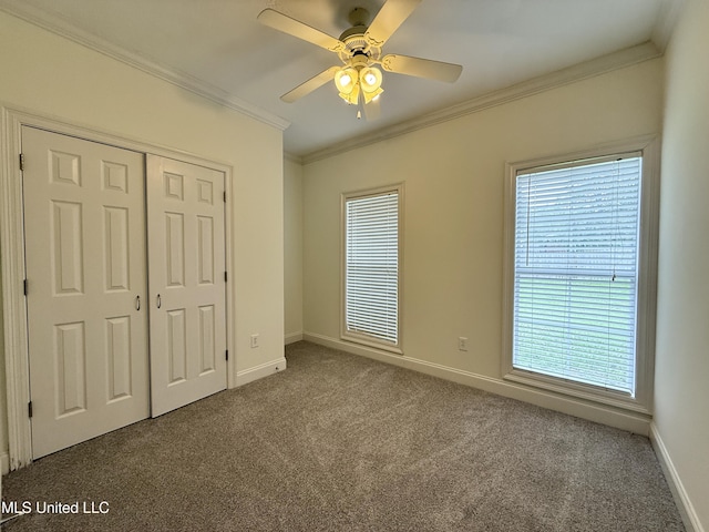 302 Bedford Ct, Brandon, MS 39047 - unfurnished bedroom featuring carpet, ornamental molding, baseboards, a closet, and a ceiling fan