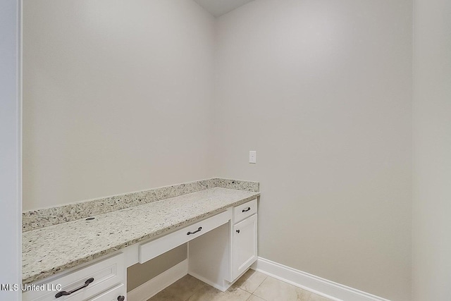 interior space with light tile patterned floors