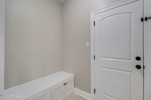 mudroom featuring light tile patterned flooring