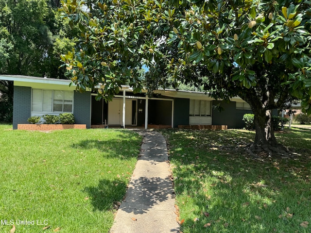 ranch-style home with a front yard