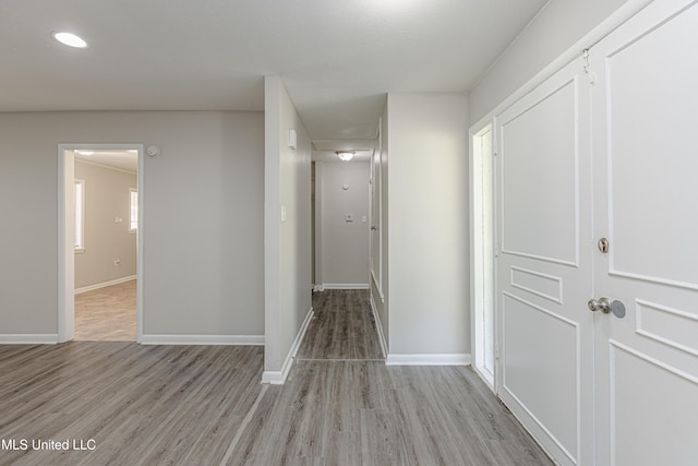 corridor featuring light wood-type flooring