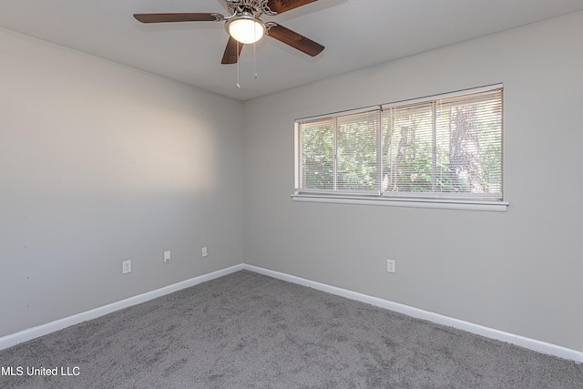 unfurnished room featuring carpet and ceiling fan