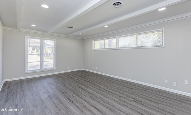 unfurnished room featuring beam ceiling, dark hardwood / wood-style flooring, and crown molding