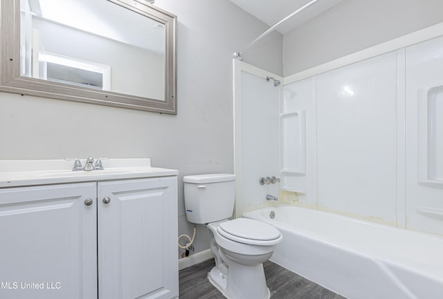 full bathroom featuring wood-type flooring, vanity, toilet, and shower / bathtub combination