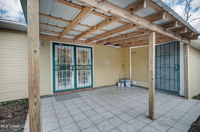 view of patio featuring french doors