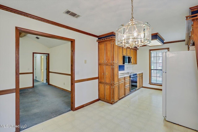 634 Twin Harbor Pl, Madison, MS 39110 - kitchen featuring freestanding refrigerator, gas stove, stainless steel microwave, baseboards, and a chandelier