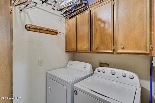634 Twin Harbor Pl, Madison, MS 39110 - laundry area featuring washing machine and dryer and cabinet space