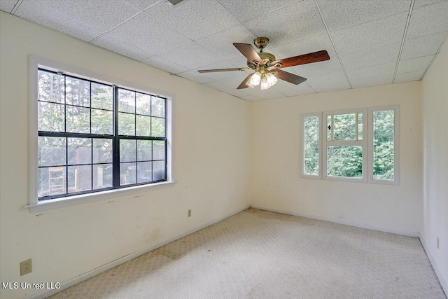634 Twin Harbor Pl, Madison, MS 39110 - empty room with carpet floors, ceiling fan, a paneled ceiling, and baseboards