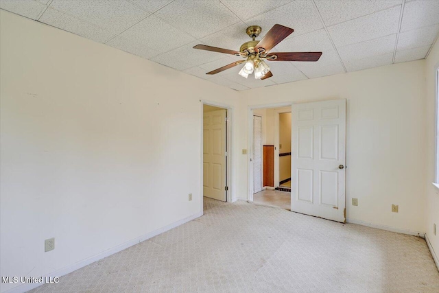 634 Twin Harbor Pl, Madison, MS 39110 - unfurnished room featuring a ceiling fan, baseboards, light colored carpet, and a paneled ceiling