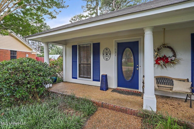 634 Twin Harbor Pl, Madison, MS 39110 - entrance to property with covered porch and stucco siding
