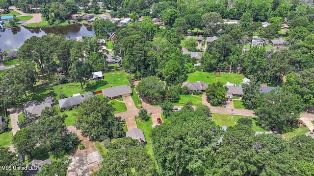 634 Twin Harbor Pl, Madison, MS 39110 - aerial view of property's location featuring a large body of water, nearby suburban area, and a tree filled landscape