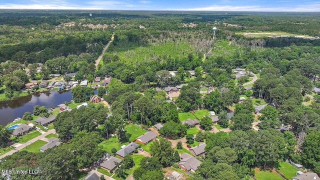 634 Twin Harbor Pl, Madison, MS 39110 - aerial view of property's location with a heavily wooded area, a nearby body of water, and nearby suburban area