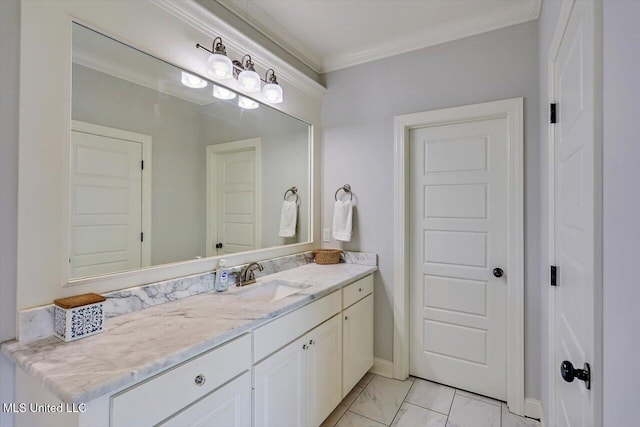 bathroom featuring vanity and ornamental molding