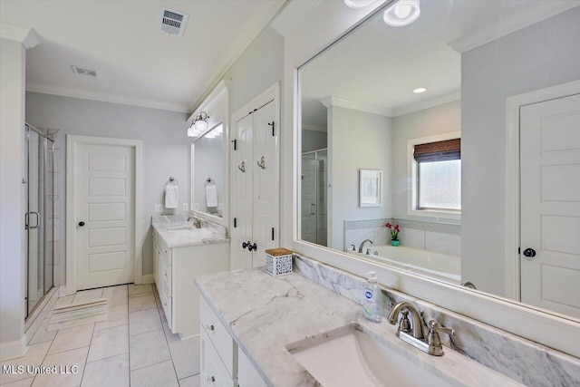 bathroom with tile patterned floors, ornamental molding, independent shower and bath, and vanity