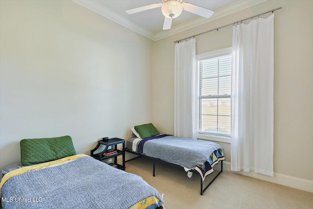 bedroom with ceiling fan, ornamental molding, and light carpet