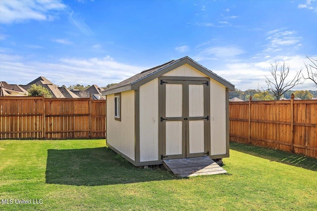 view of outdoor structure with a yard