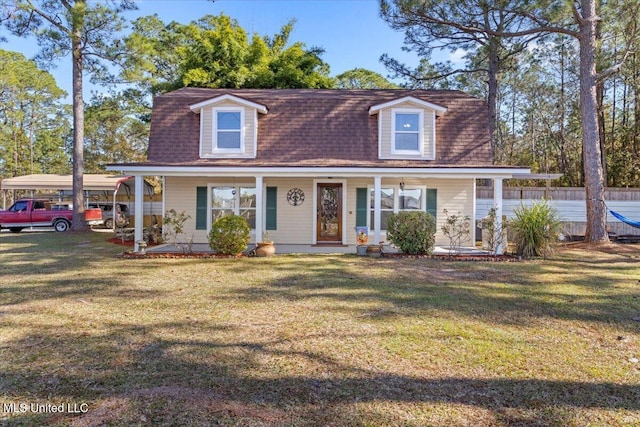 cape cod home featuring a front lawn, a porch, and a carport