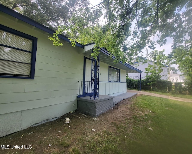 exterior space with a yard