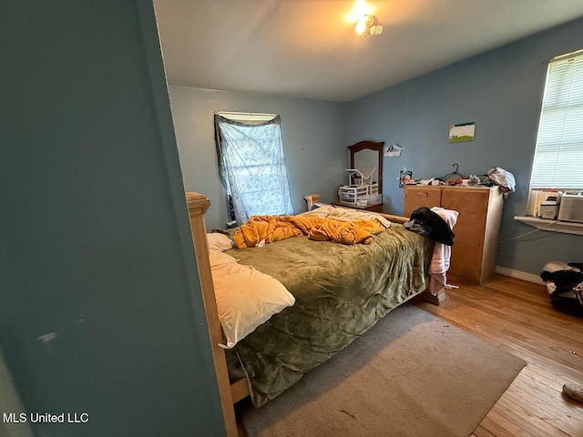 519 Copp St, Biloxi, MS 39530 - bedroom with baseboards and hardwood / wood-style flooring