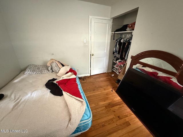 519 Copp St, Biloxi, MS 39530 - bedroom featuring a closet and wood finished floors