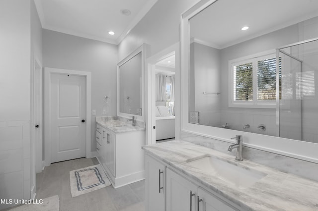 bathroom featuring vanity and ornamental molding