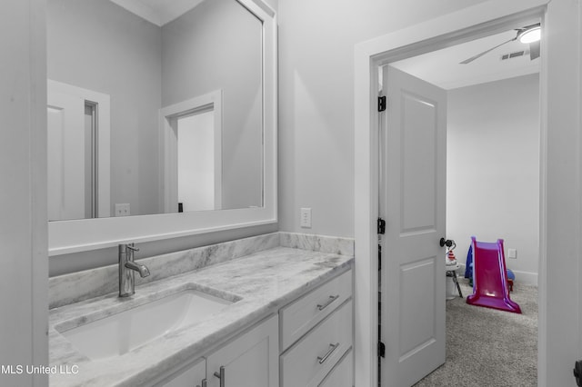 bathroom featuring vanity and ceiling fan