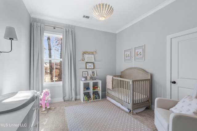 bedroom featuring multiple windows, ornamental molding, light carpet, and a nursery area