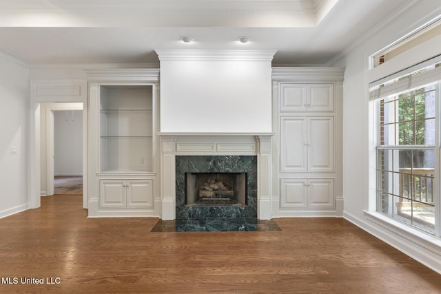 52 Eastgate Dr, Brandon, MS 39042 - unfurnished living room with wood finished floors, crown molding, and a fireplace