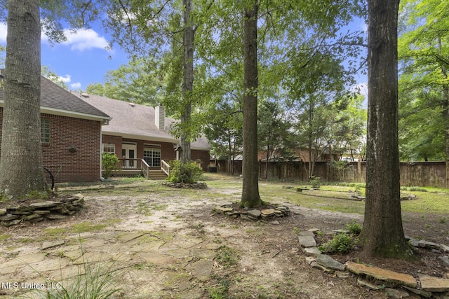 52 Eastgate Dr, Brandon, MS 39042 - view of yard with a deck and a patio
