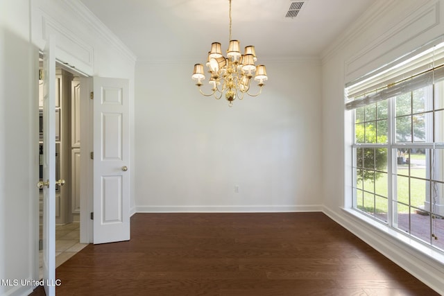 52 Eastgate Dr, Brandon, MS 39042 - spare room with a chandelier, dark wood-type flooring, and ornamental molding