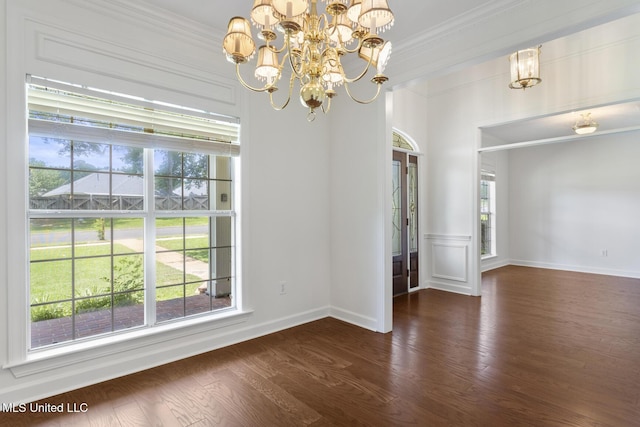 52 Eastgate Dr, Brandon, MS 39042 - unfurnished dining area featuring a chandelier, wood finished floors, and crown molding
