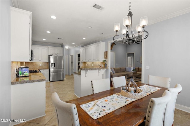 dining room with light tile patterned floors, recessed lighting, visible vents, and ornamental molding