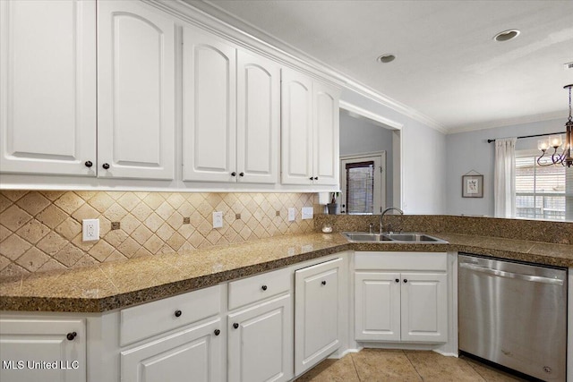 kitchen featuring ornamental molding, a sink, stainless steel dishwasher, white cabinets, and decorative backsplash