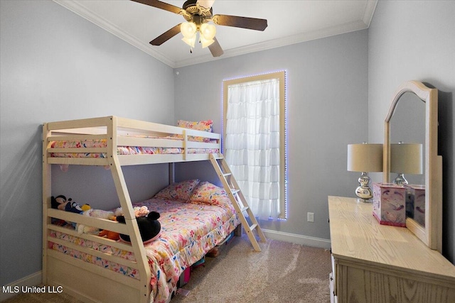 bedroom with crown molding, baseboards, carpet floors, and ceiling fan