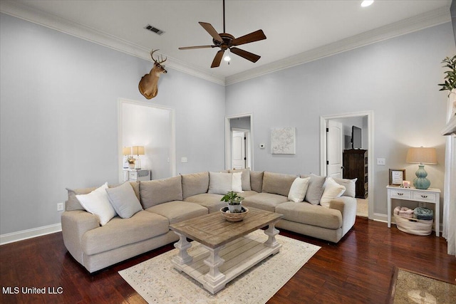 living room with baseboards, visible vents, dark wood-style flooring, and ornamental molding