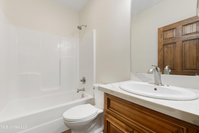 full bathroom with toilet, vanity, and shower / tub combination