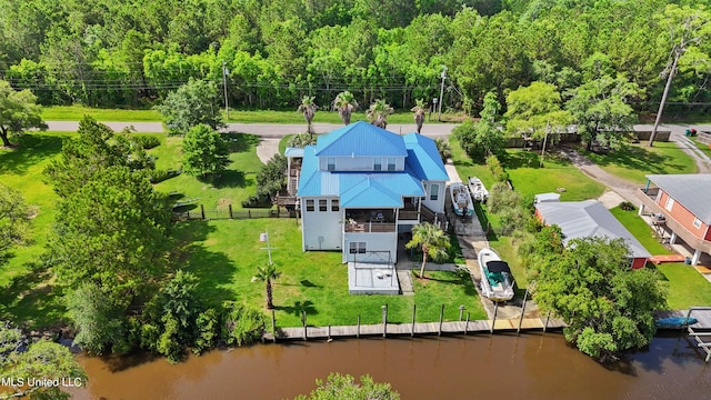 birds eye view of property featuring a water view