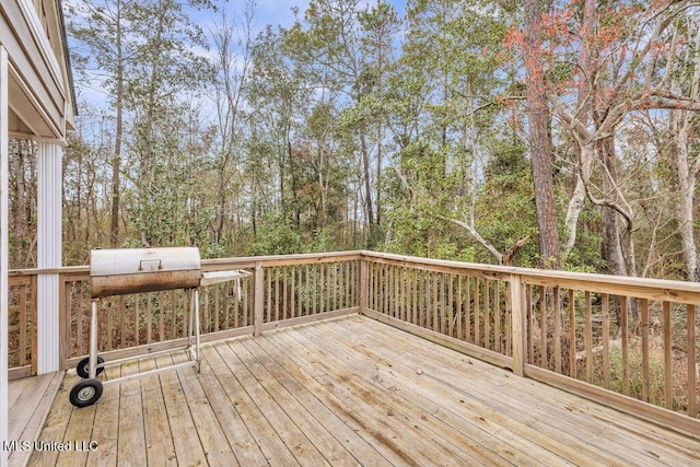 wooden deck with area for grilling