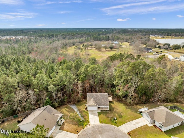 aerial view with a wooded view