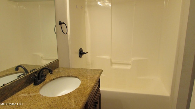 full bath featuring shower / bath combination and vanity