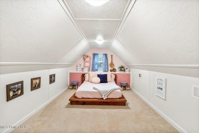 bedroom featuring carpet floors, a textured ceiling, and vaulted ceiling