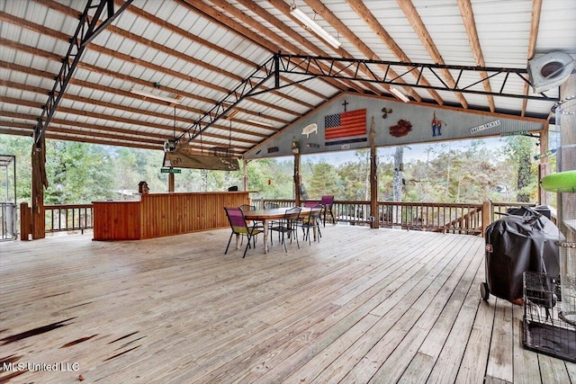 wooden terrace with area for grilling