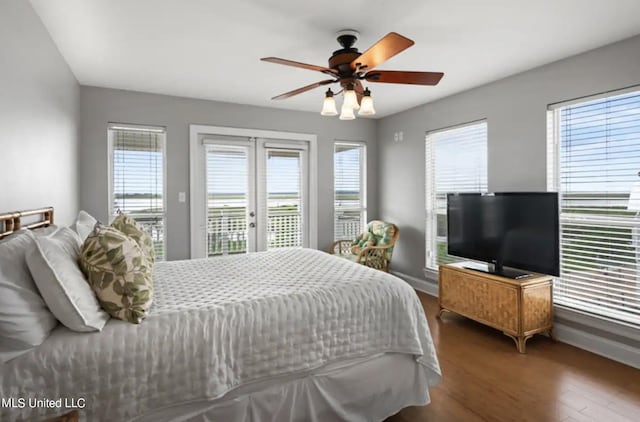 4011 S Nassau St, Bay Saint Louis, MS 39520 - bedroom with access to outside, wood finished floors, baseboards, and french doors