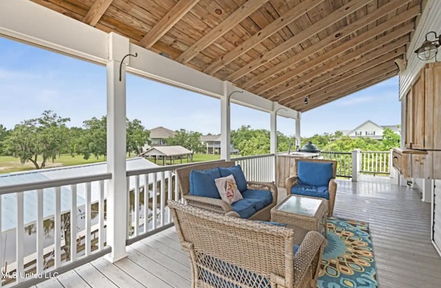 4011 S Nassau St, Bay Saint Louis, MS 39520 - wooden terrace with an outdoor hangout area