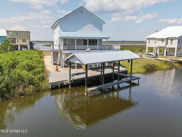 dock area with a water view