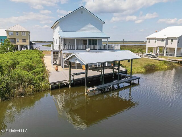 4011 S Nassau St, Bay Saint Louis, MS 39520 - dock with boat lift, a water view, and stairway