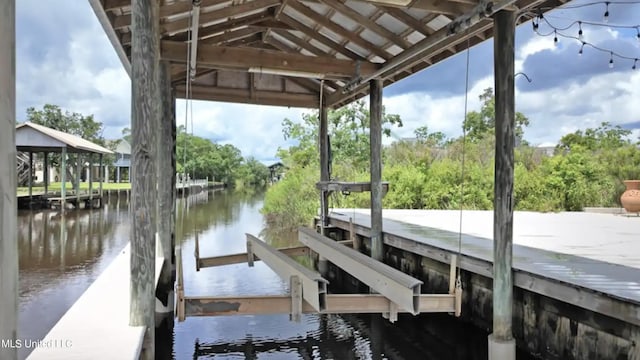 view of dock with a water view