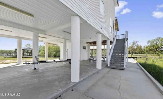 4011 S Nassau St, Bay Saint Louis, MS 39520 - view of patio featuring stairway